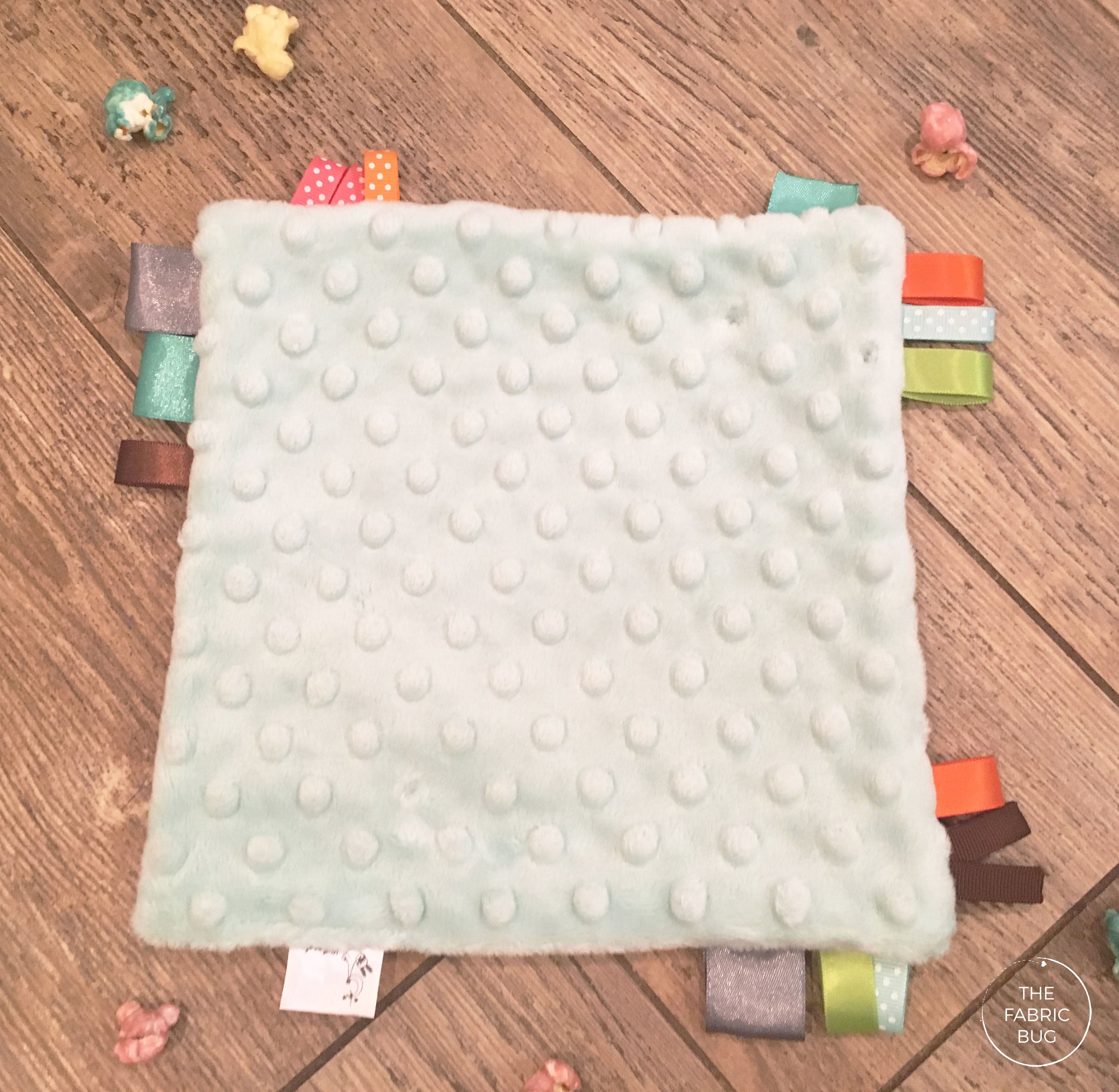 Elephant taggie blanket top